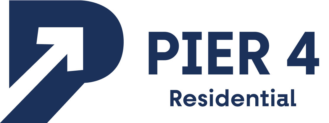 A graphic with a dark blue arrow pointing up and the words "PIER 4 Residential" in white.